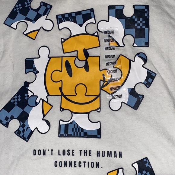 NWT White Graphic T-Shirt with Puzzle Design
“Don’t lose the human connection “ - Picture 1 of 2